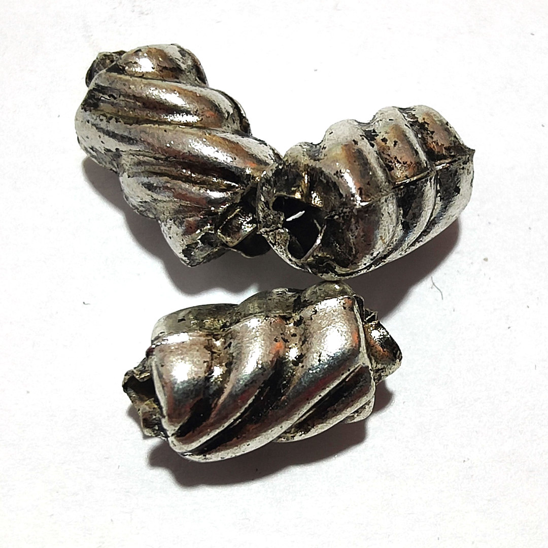 Indian Metal Bead 14: Twisted Barrel (8 x 14mm) image 0