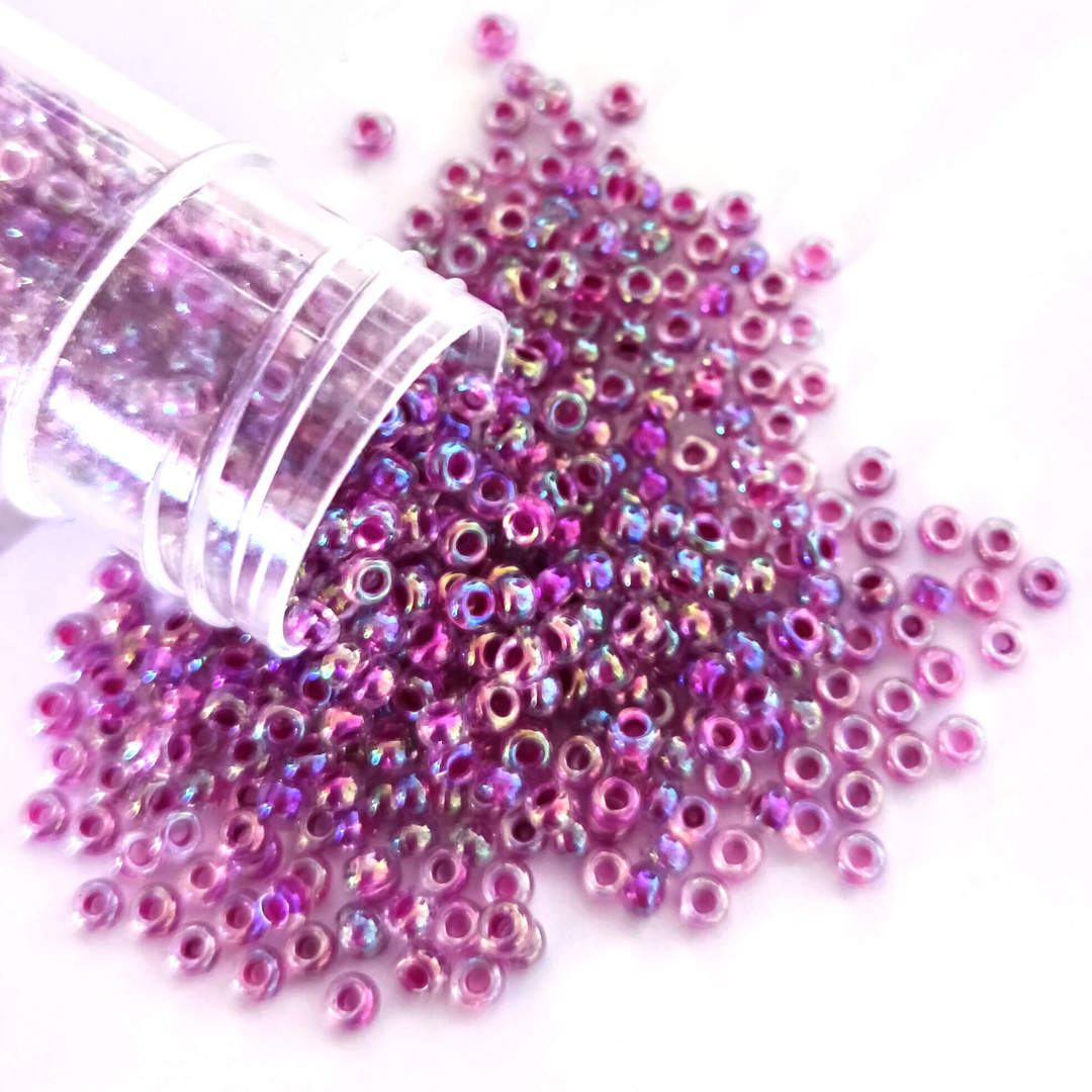 Miyuki size 11 round, 264: Purple lined crystal shimmer (7 grams) image 0
