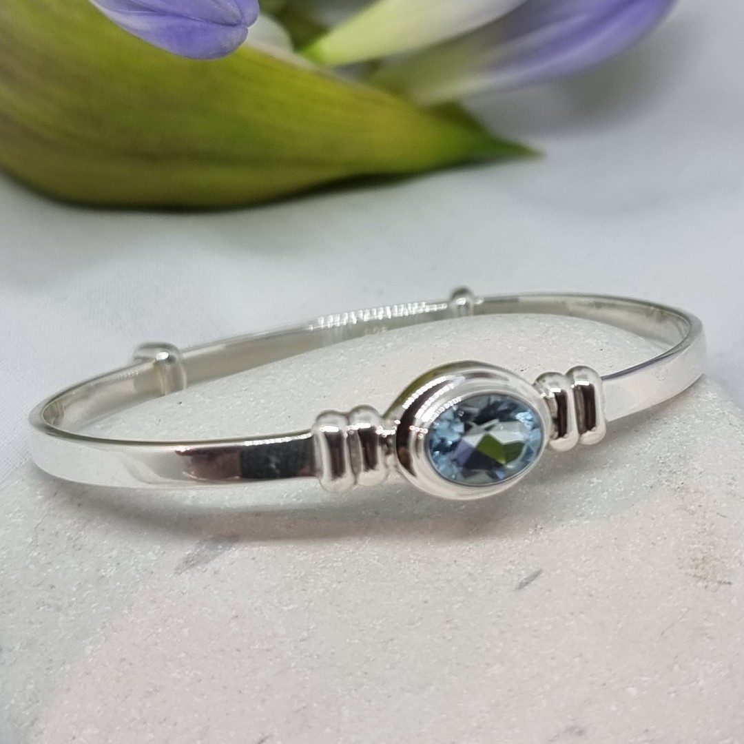 Silver adjustable baby bangle with blue topaz image 4