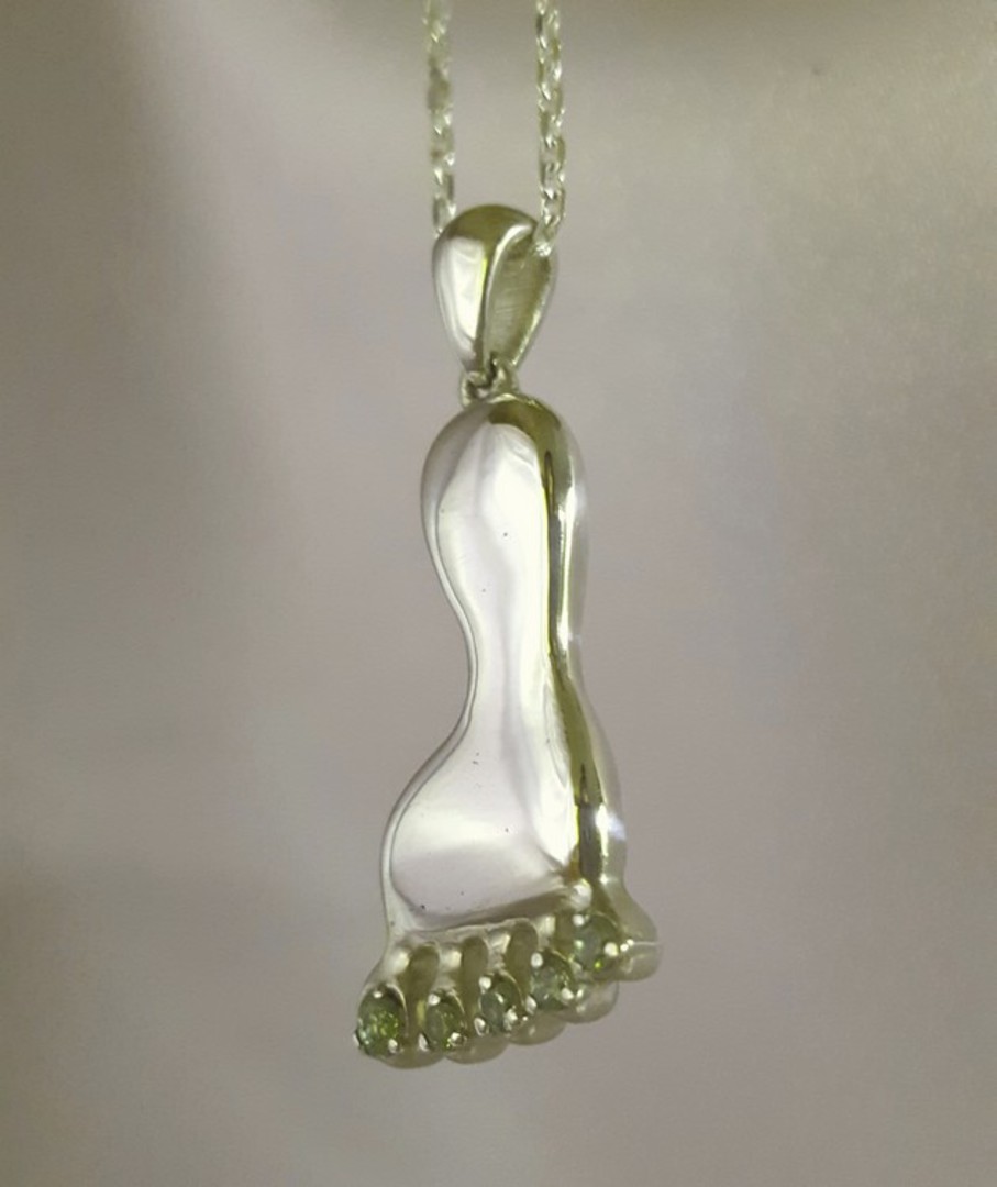 Made in NZ, quirky silver foot pendant with peridot image 1