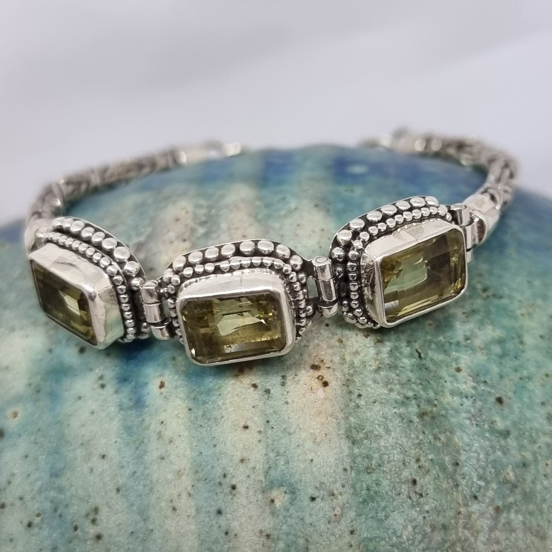 Sterling silver bracelet with green gemstones image 1