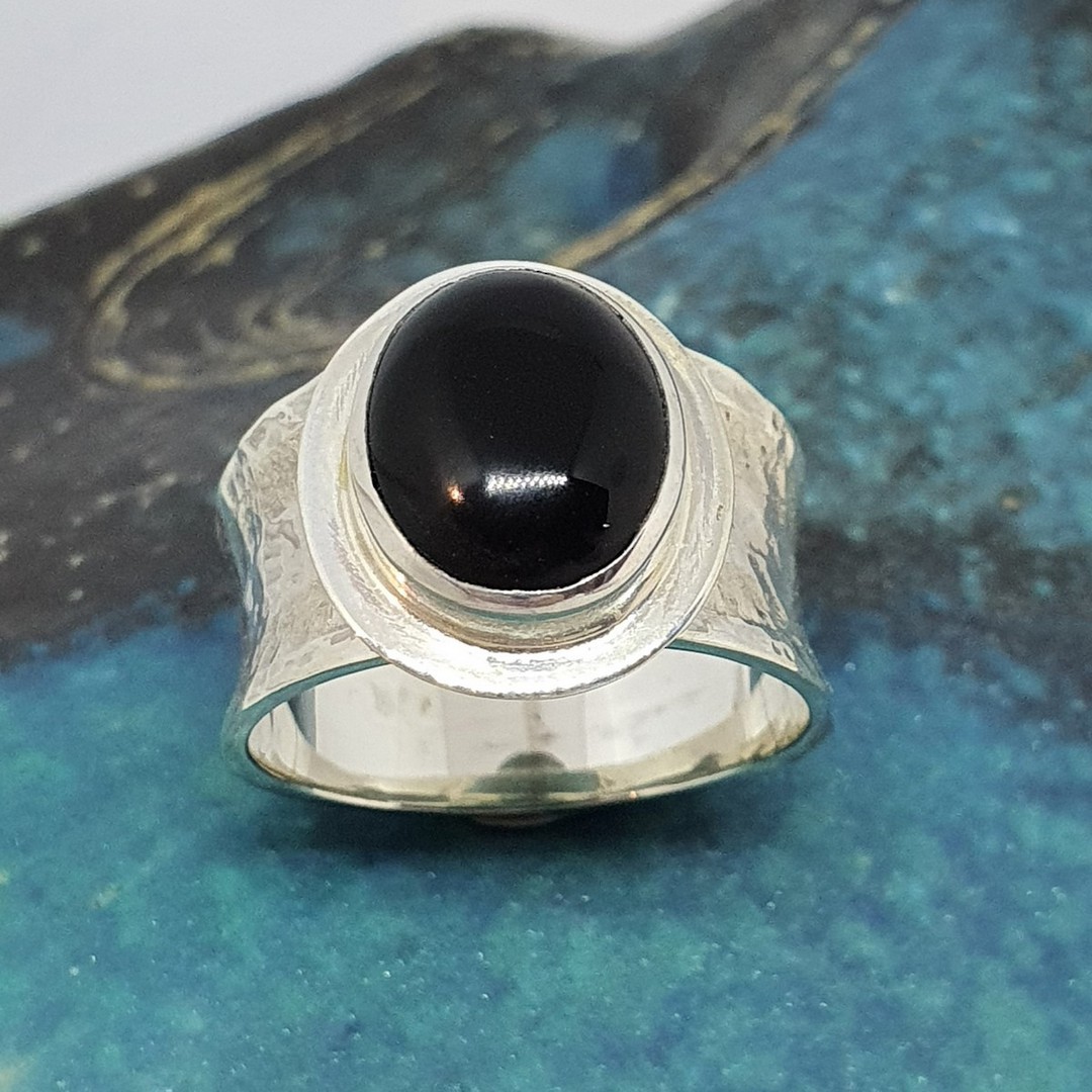 Sterling silver black onyx ring with wide hammered band image 1