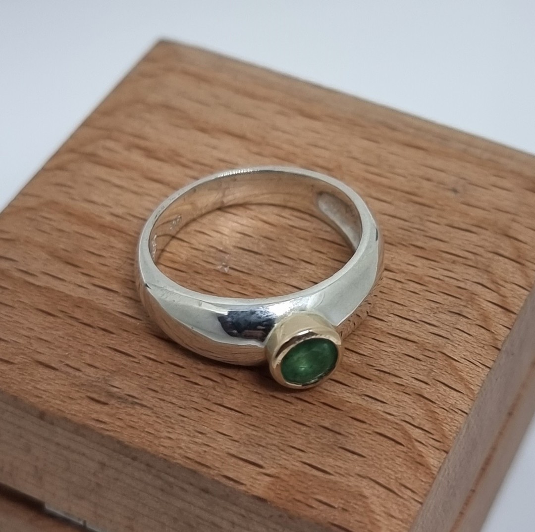 Silver ring with natural emerald in 9ct gold setting image 2