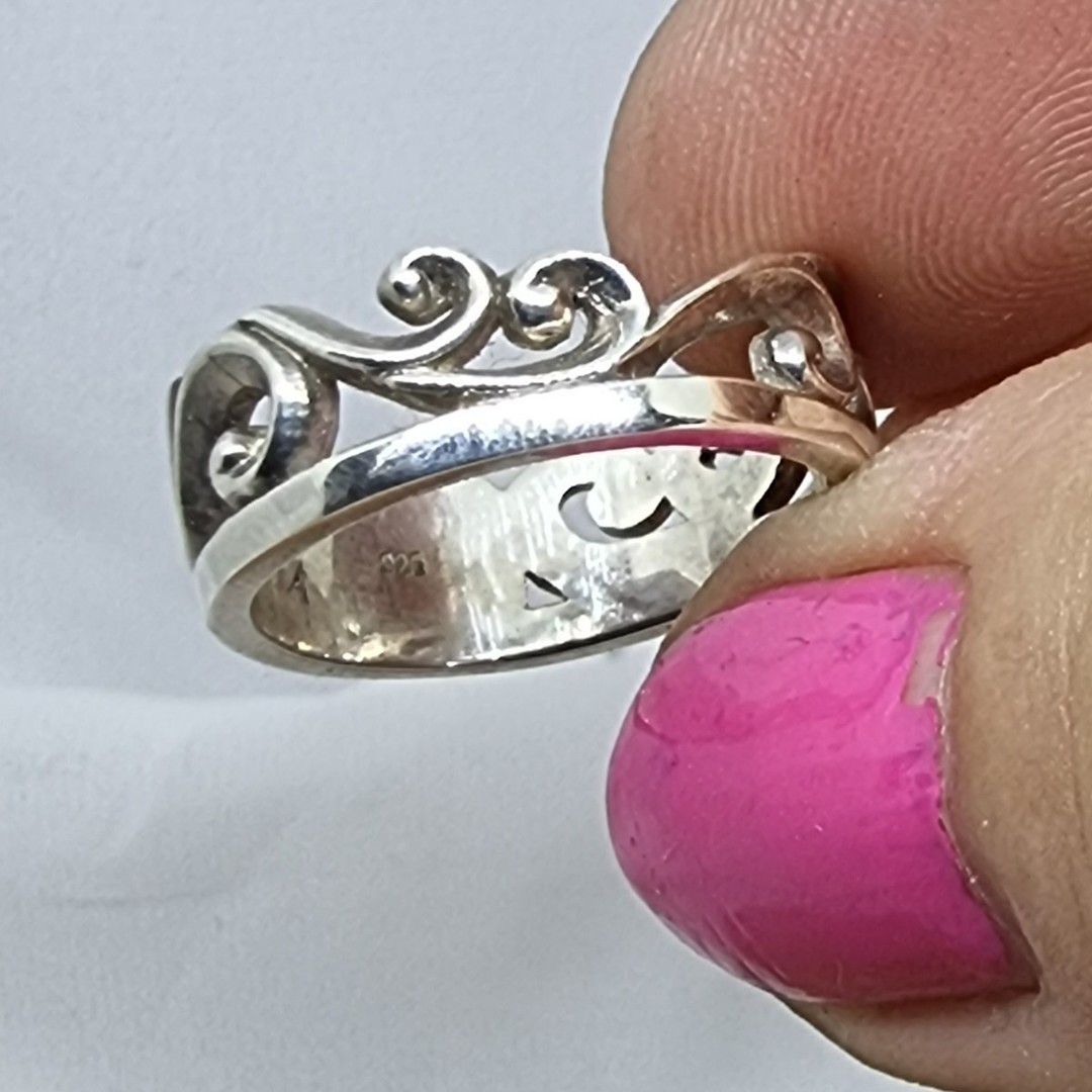 Sterling silver ring with koru details in band image 0