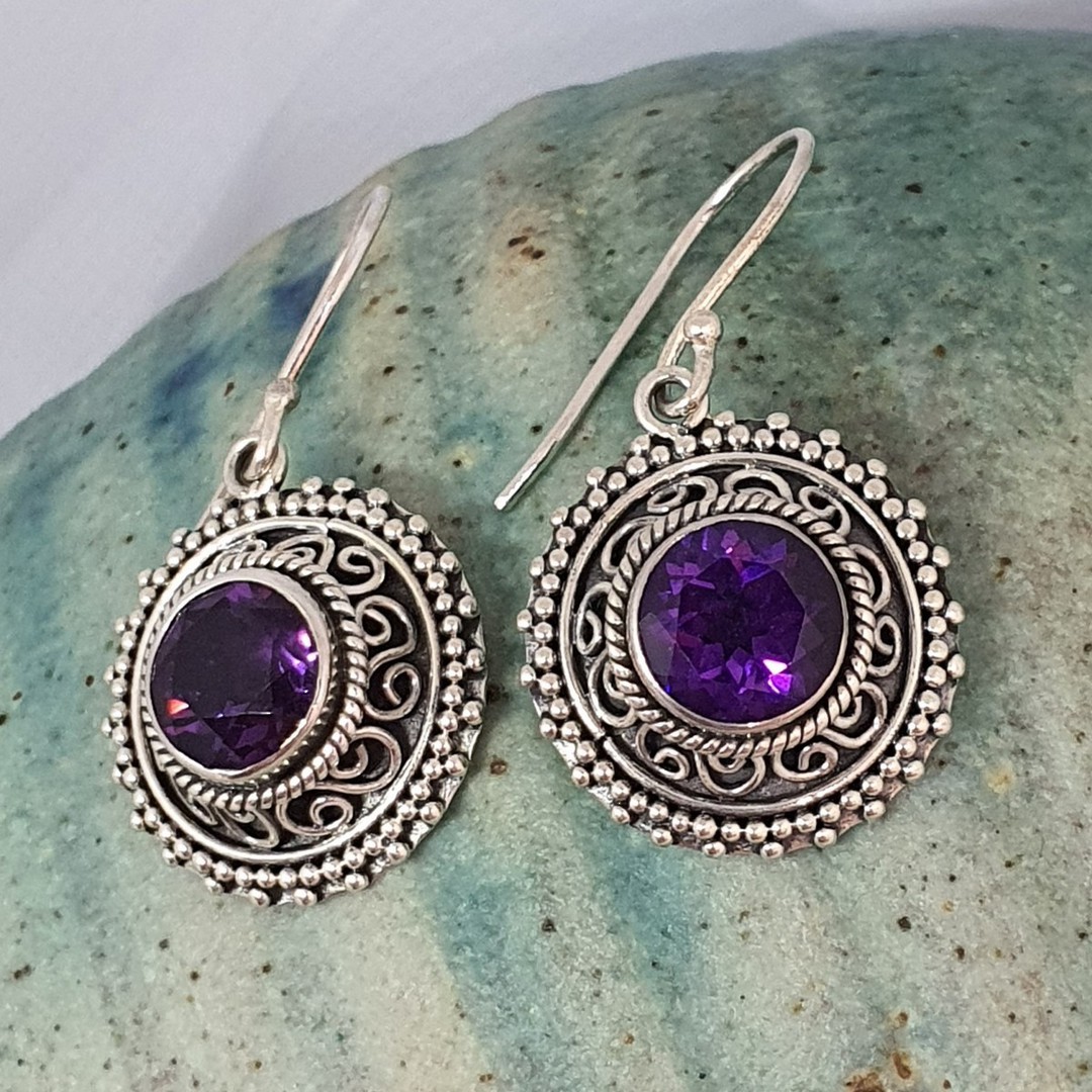 Silver earrings with purple stone image 0
