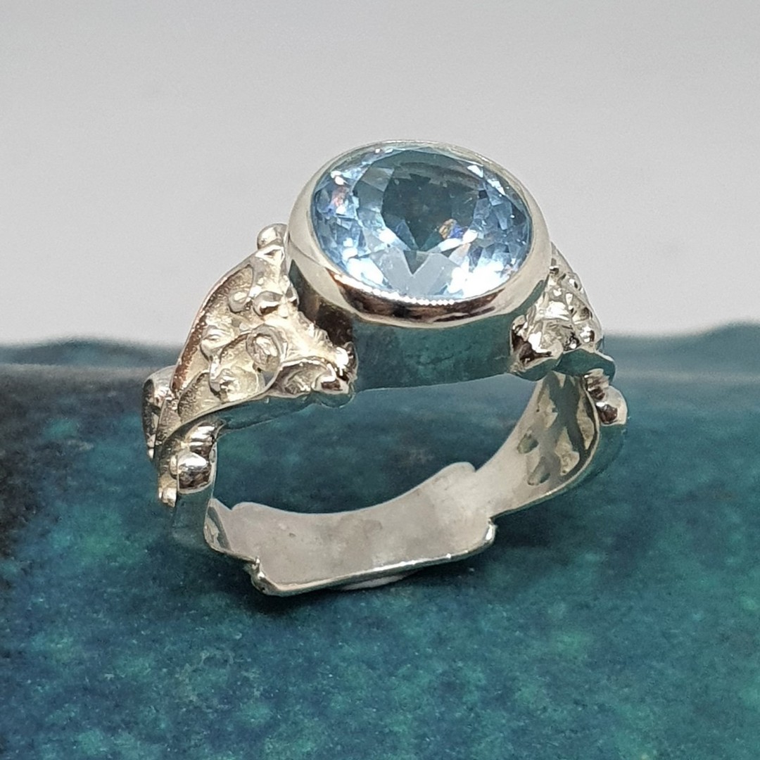 Sterling silver blue topaz gemstone ring image 0