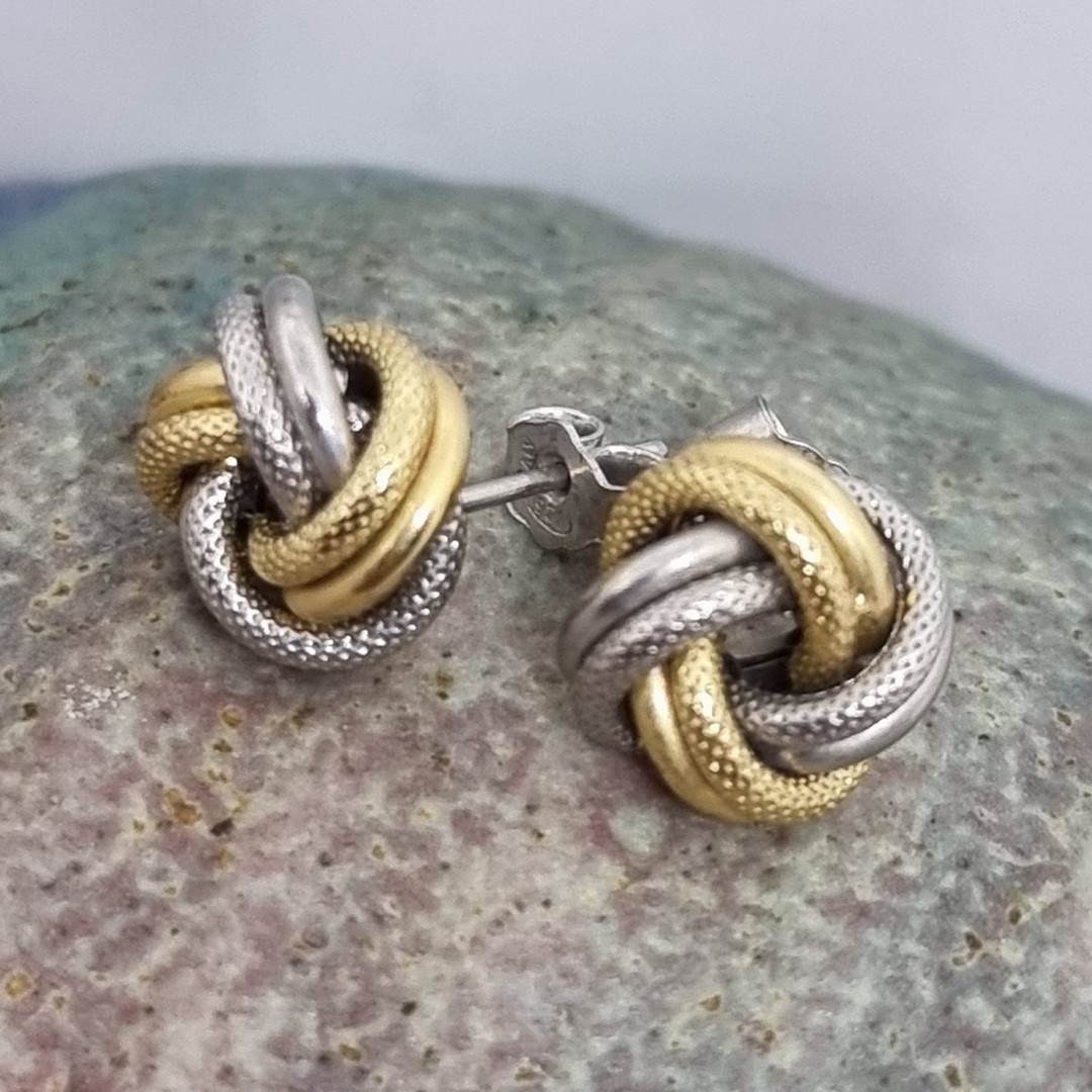 Silver knot stud earrings with gold plating image 0