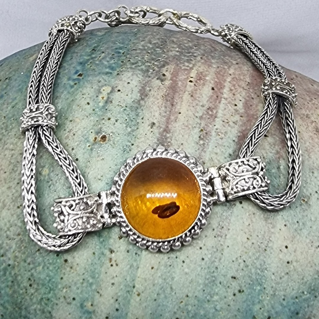 Sterling silver bracelet with round amber gemstone image 1