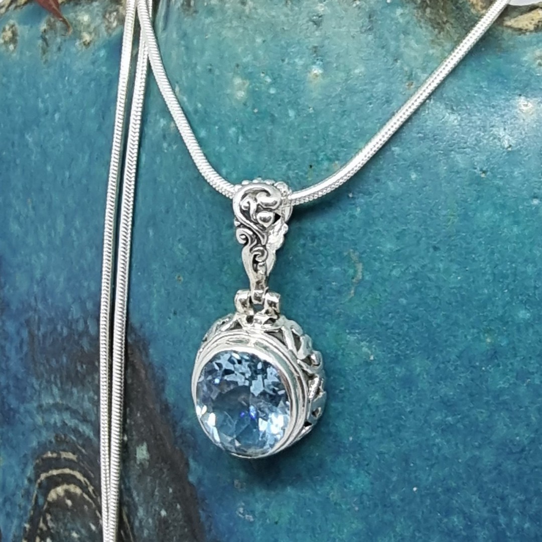 Sterling silver oval blue topaz pendant image 1
