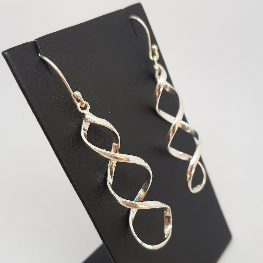Silver infinity spiral earrings, longer style image 1