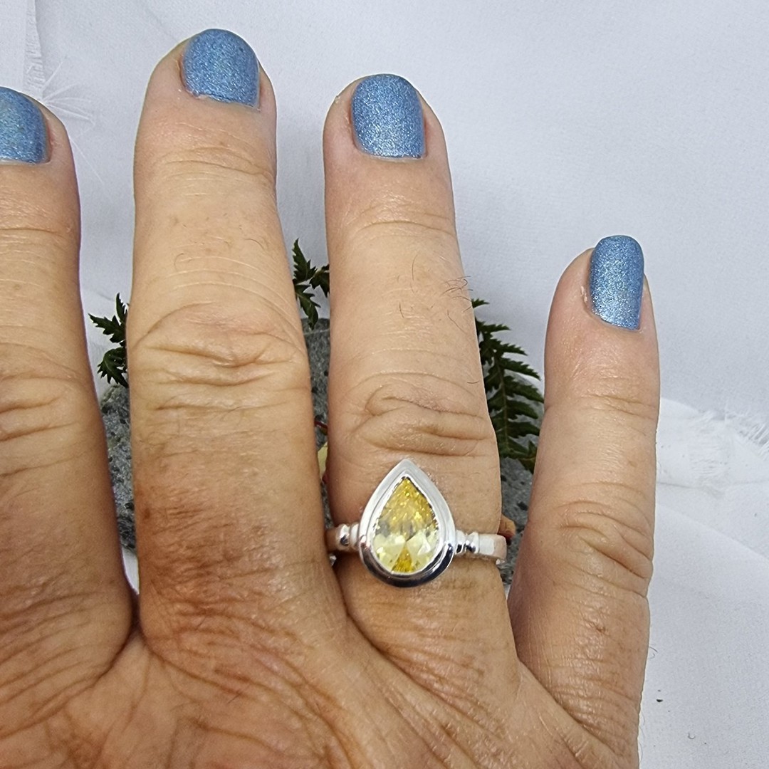 Silver ring with golden sparkling cz stone image 1