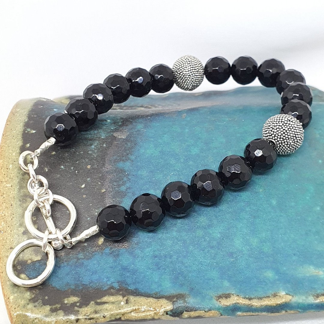 Facet cut black onyx beads and silver bracelet image 0