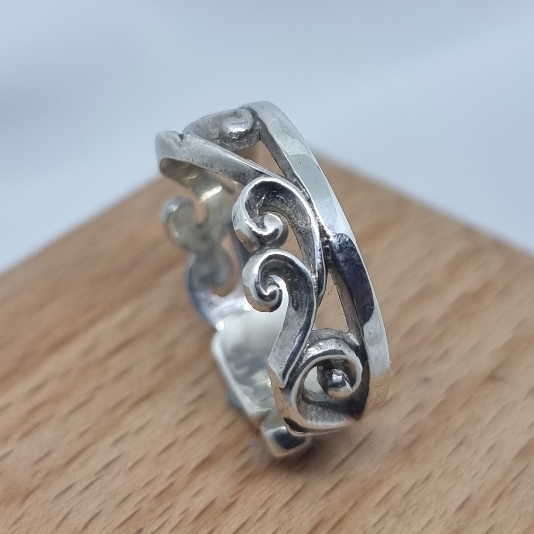 Sterling silver ring with koru details in band image 3