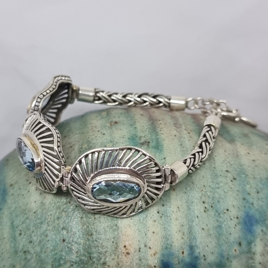 Stunning sterling silver bracelet with blue topaz gemstones image 1