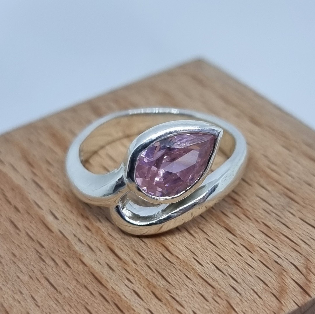 Silver ring with sparkling pink gemstone image 2