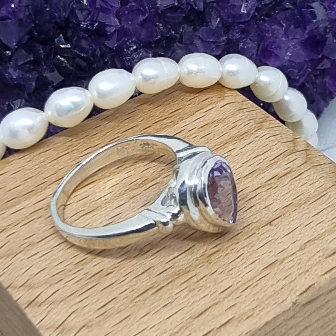 Silver ring with sparkling purple gemstone image 2