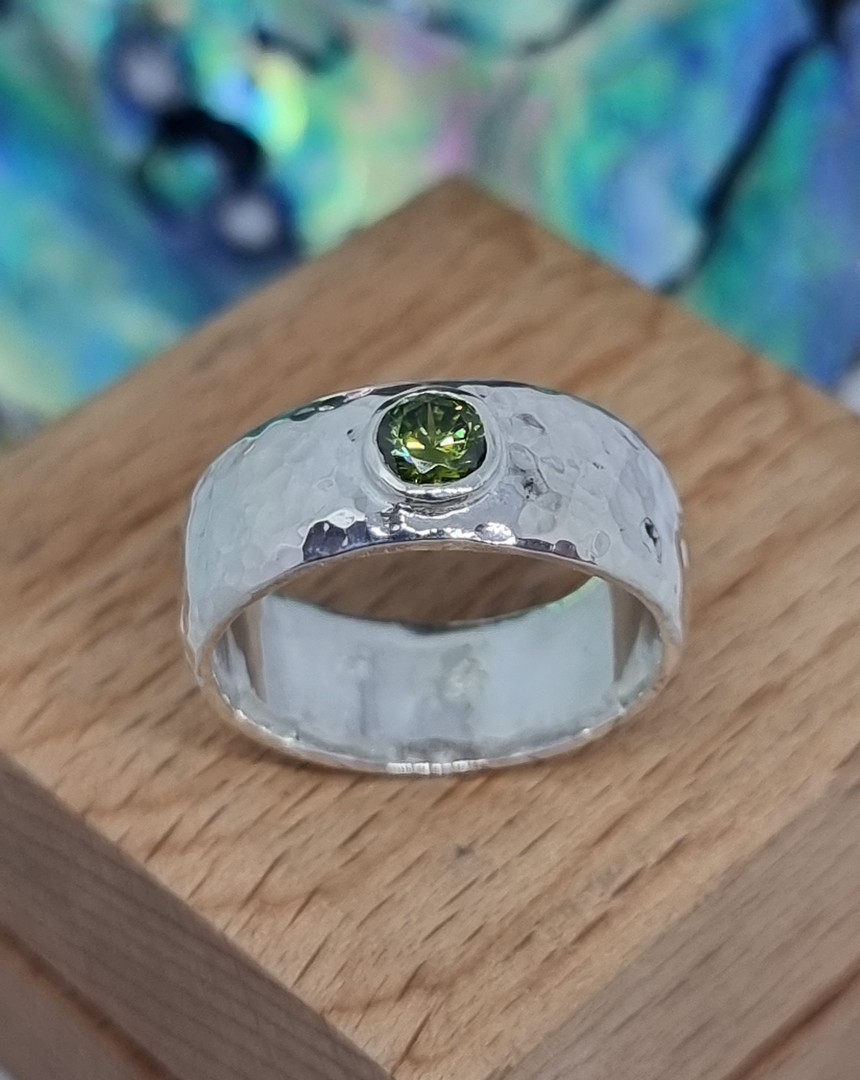 Sterling silver hammered band with green gemstone image 0