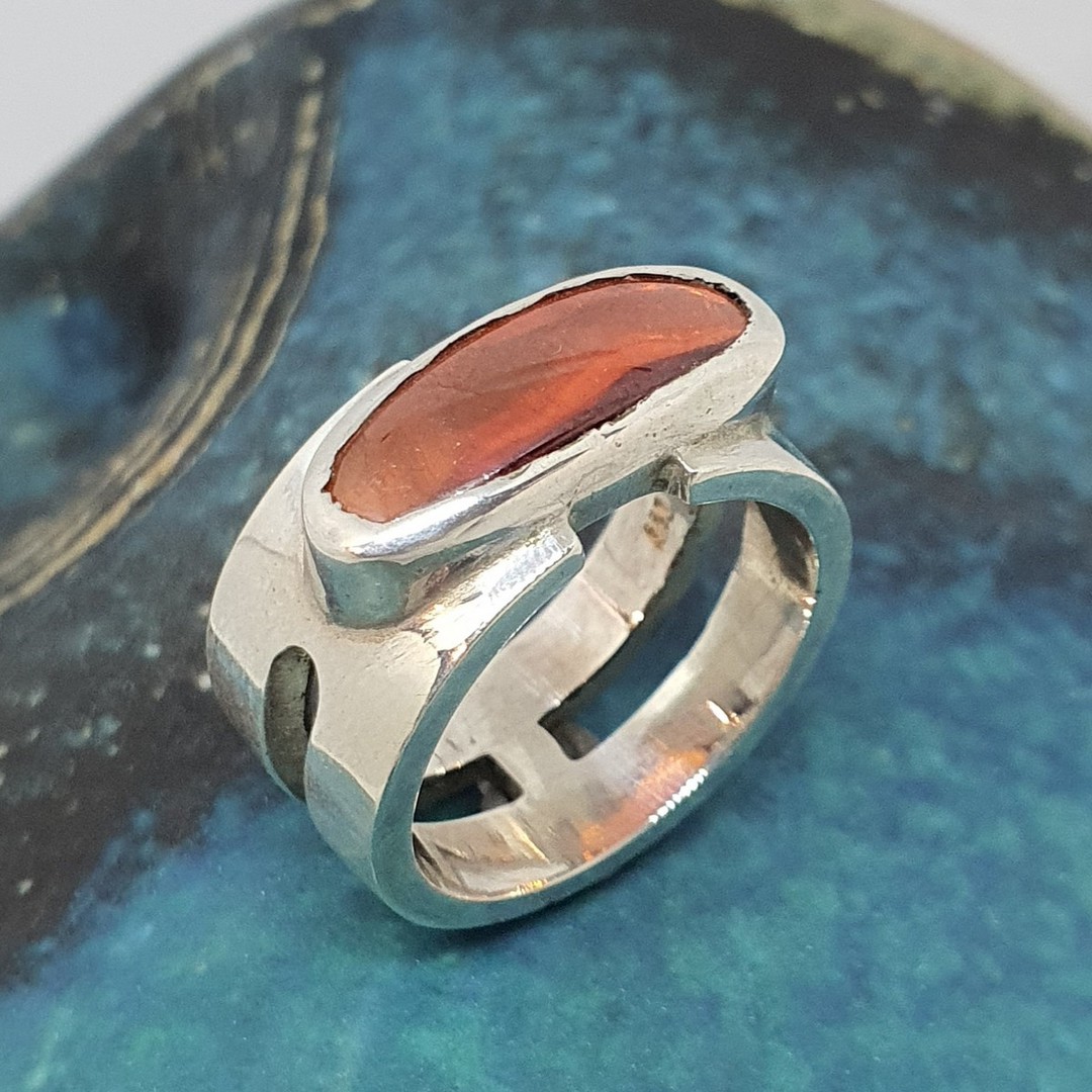 Wide band silver ring with orange stone image 1