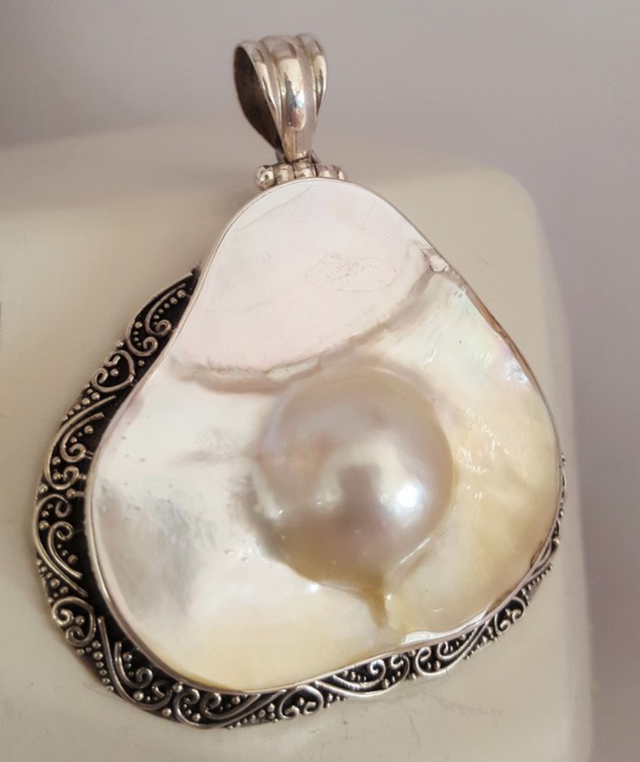 Large mother of pearl pendant with blister pearl image 0