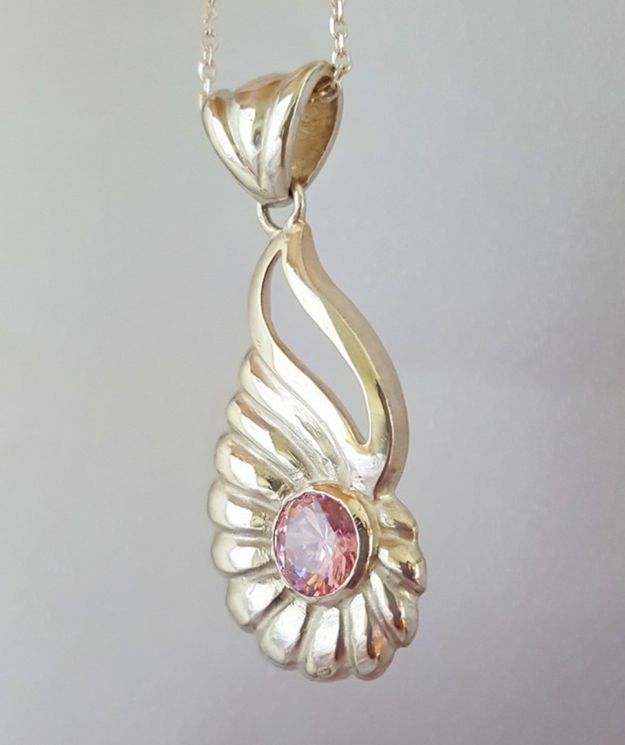Curved silver shell pendant with pink gemstone image 1
