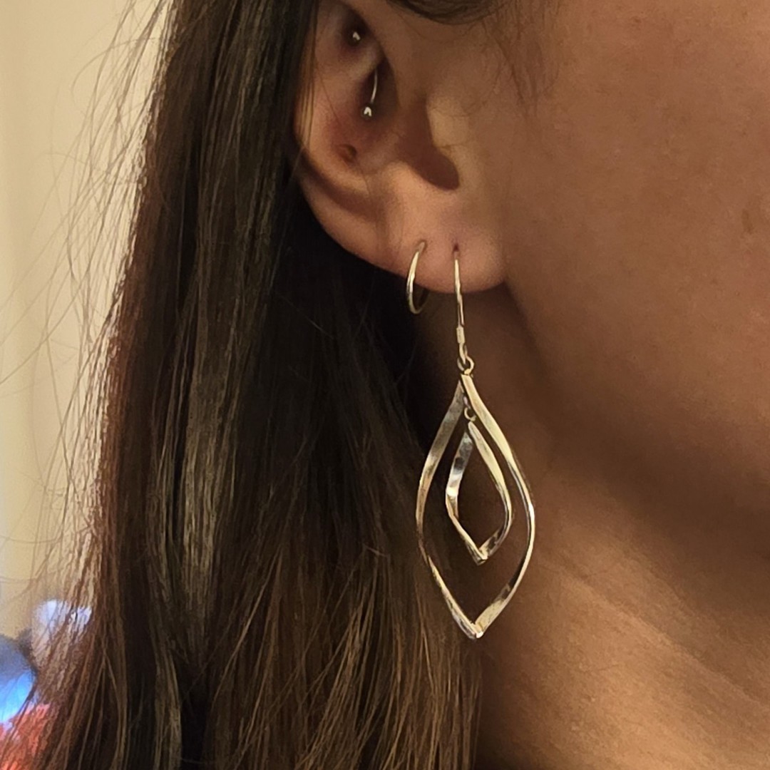 Silver twisted hoop earrings image 1