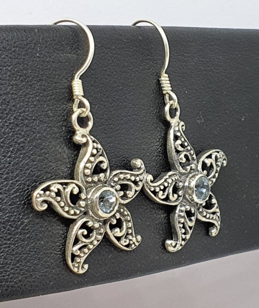 Sterling silver blue topaz flower earrings image 1