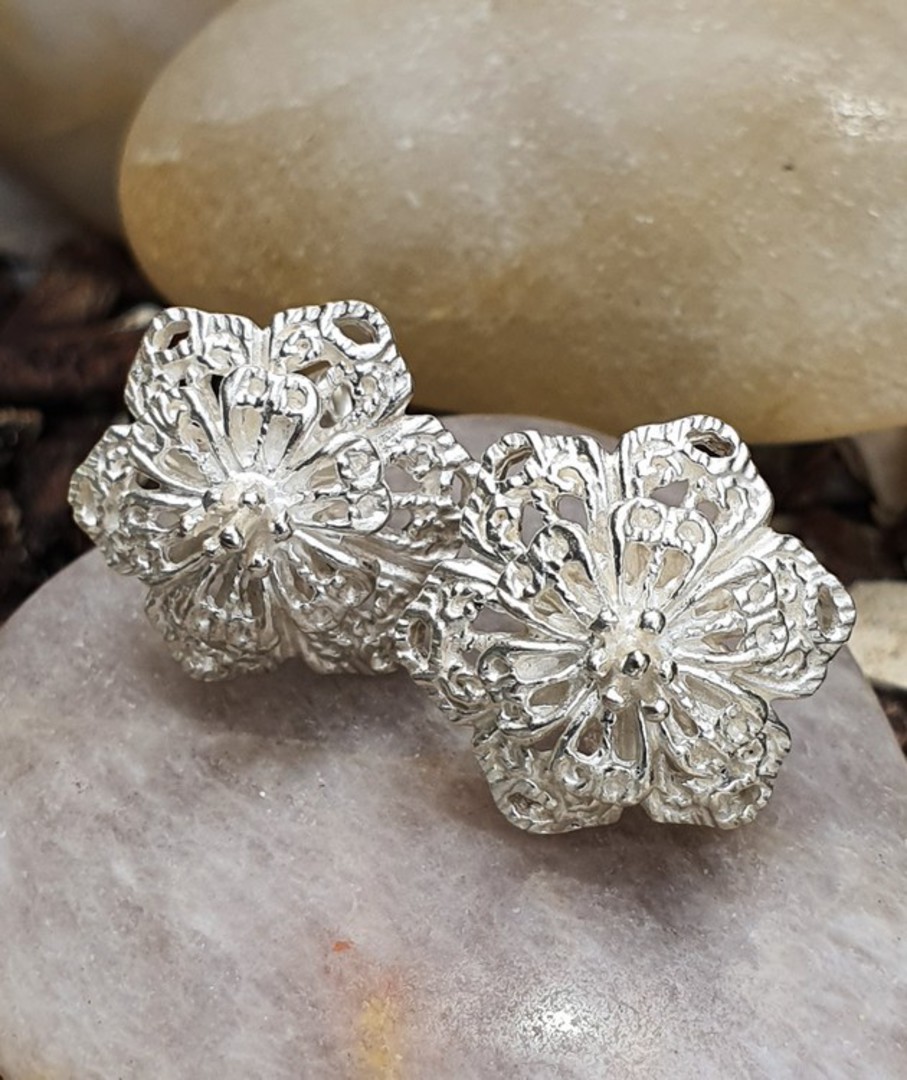 Silver flower stud earrings - now on sale image 0