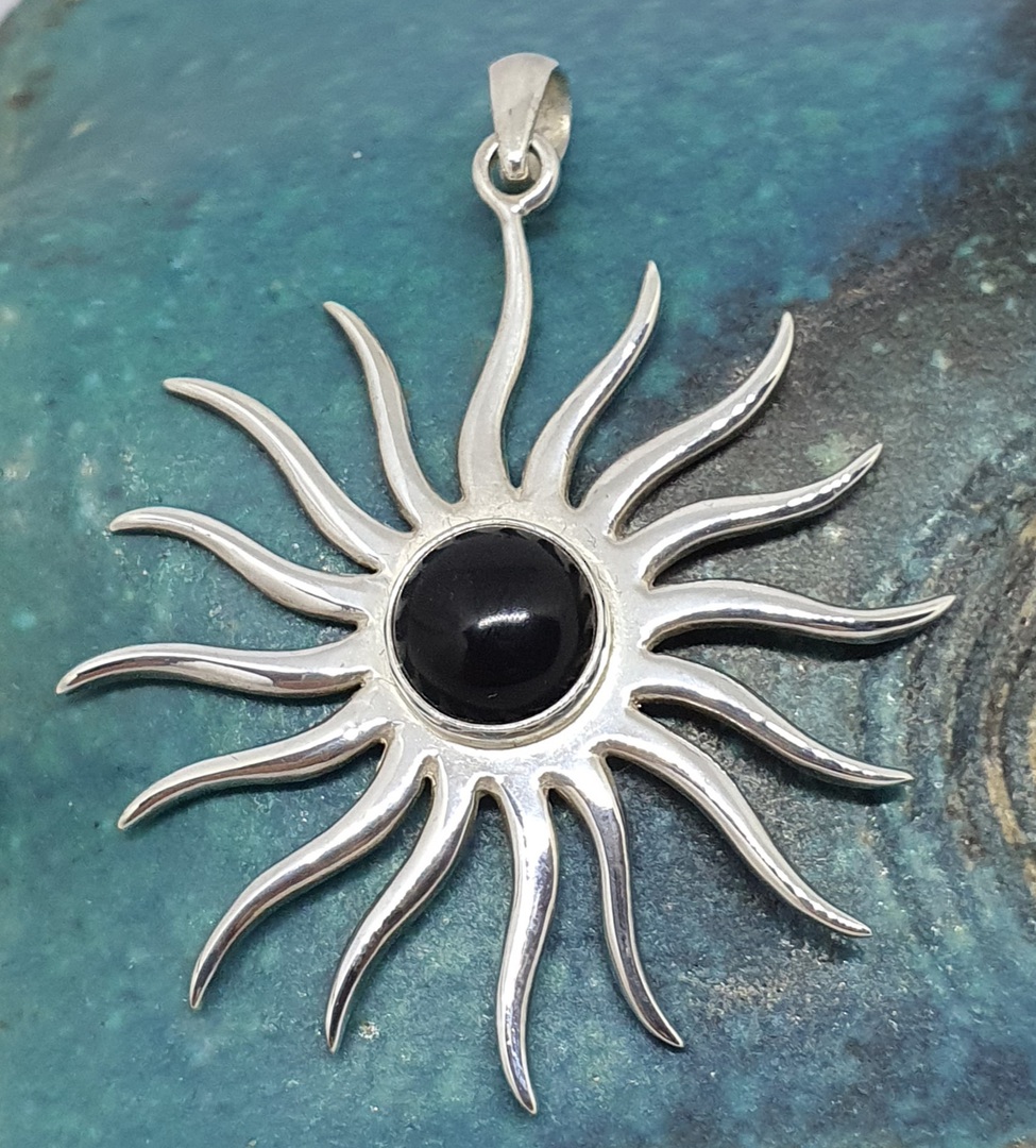 Sterling silver star pendant with black onyx image 0