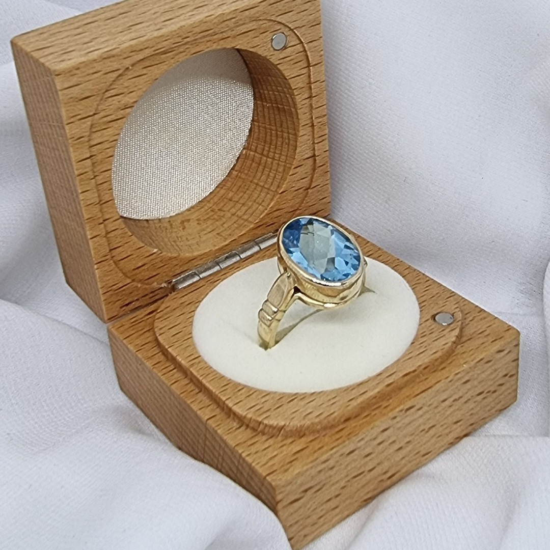 9ct yellow gold, blue topaz solitaire ring image 1