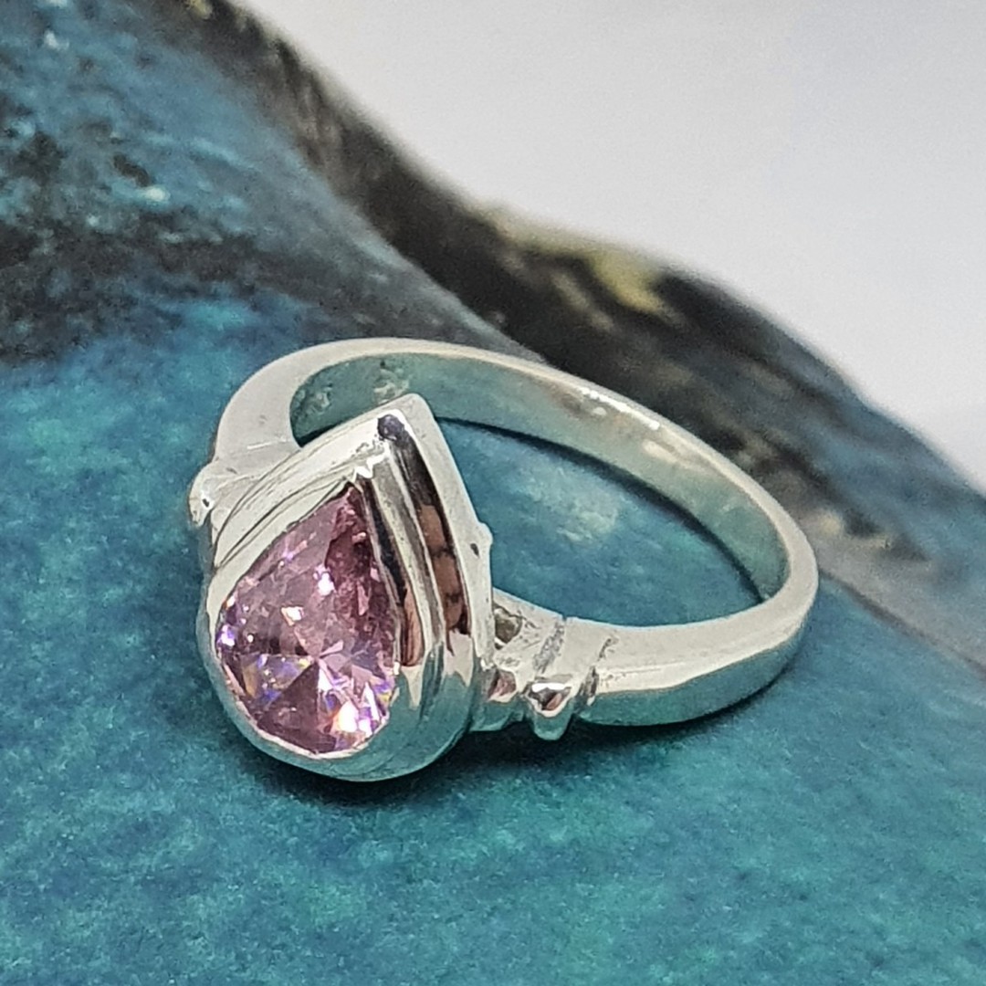 Silver ring with pink sparkling stone image 0