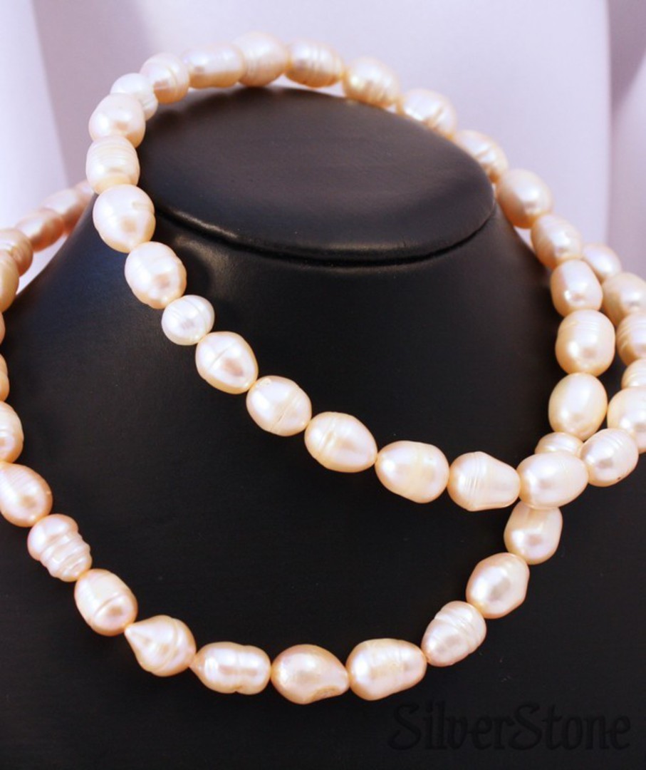 String of peach coloured fresh water pearls image 0