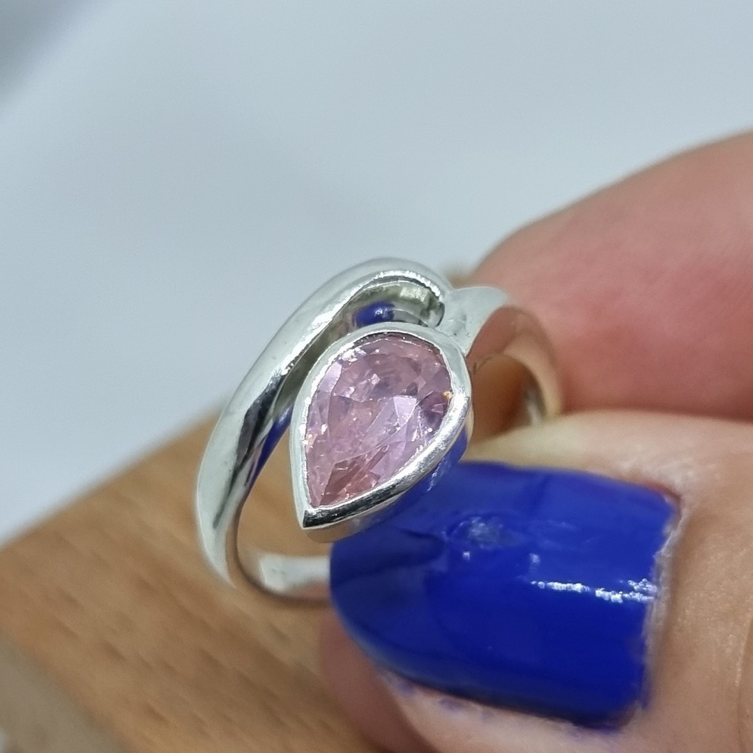 Silver ring with sparkling pink gemstone image 1