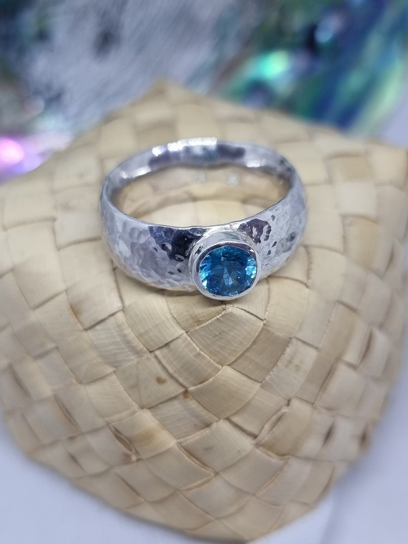 Sterling silver hammered band with blue topaz image 1