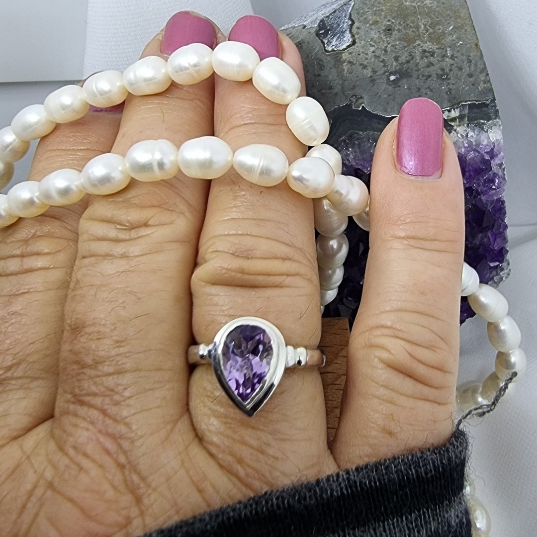 Silver ring with sparkling purple gemstone image 1