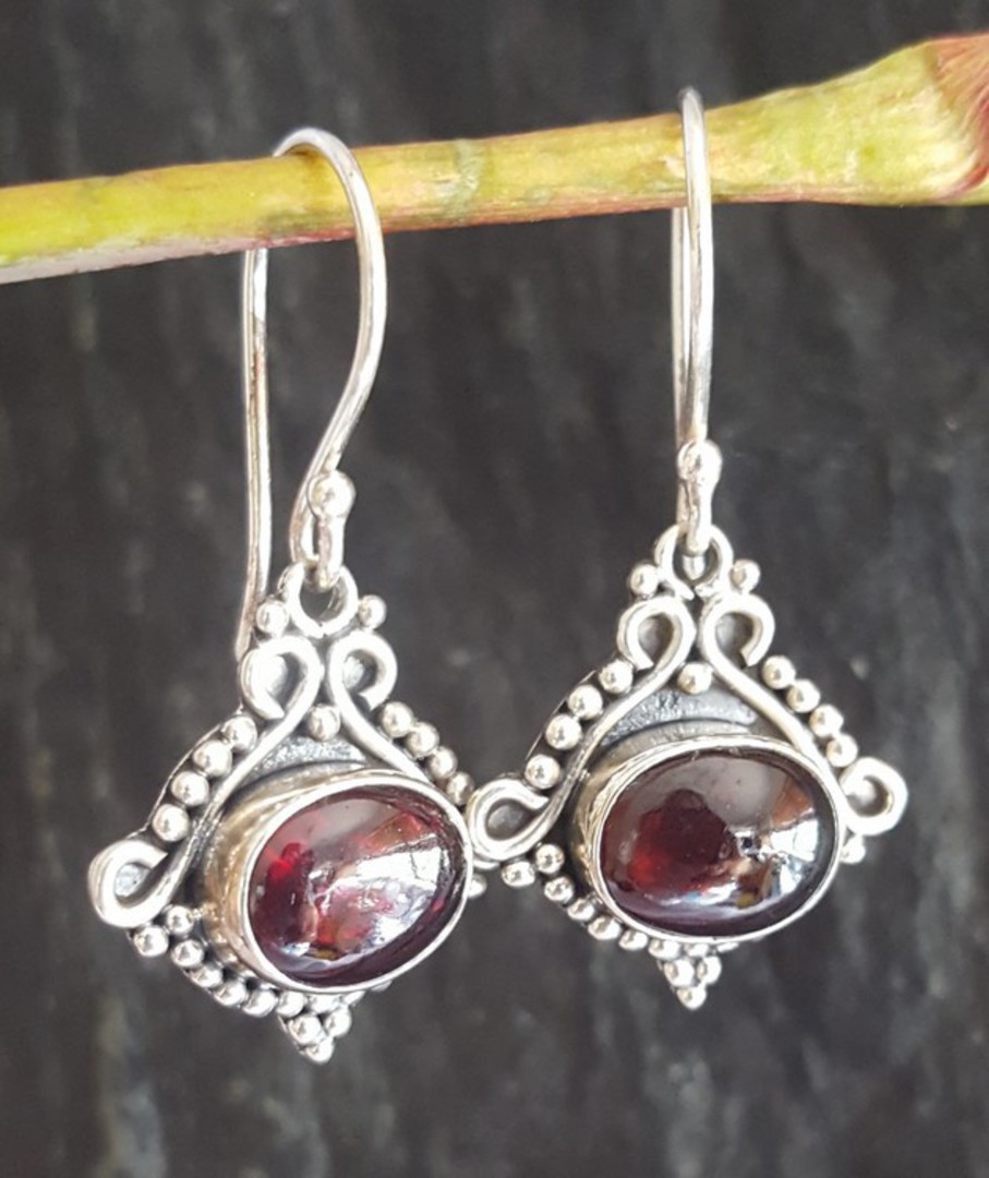 Sterling silver garnet earrings in decorative frame image 1