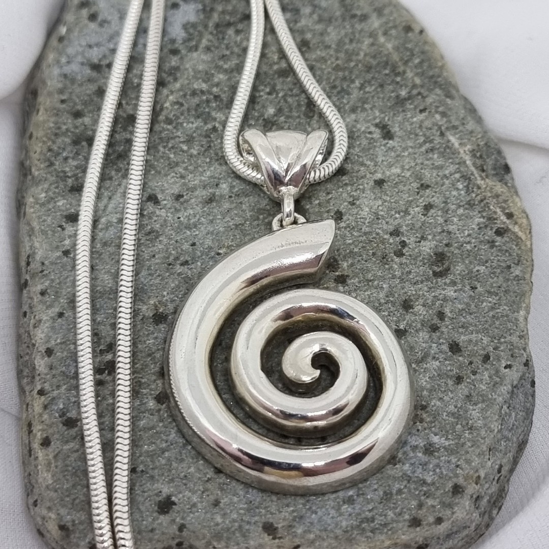 Solid silver koru pendant - made in NZ image 6