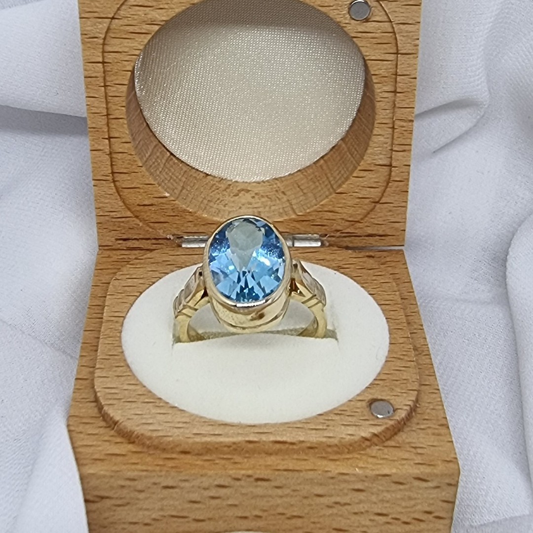 9ct yellow gold, blue topaz solitaire ring image 4