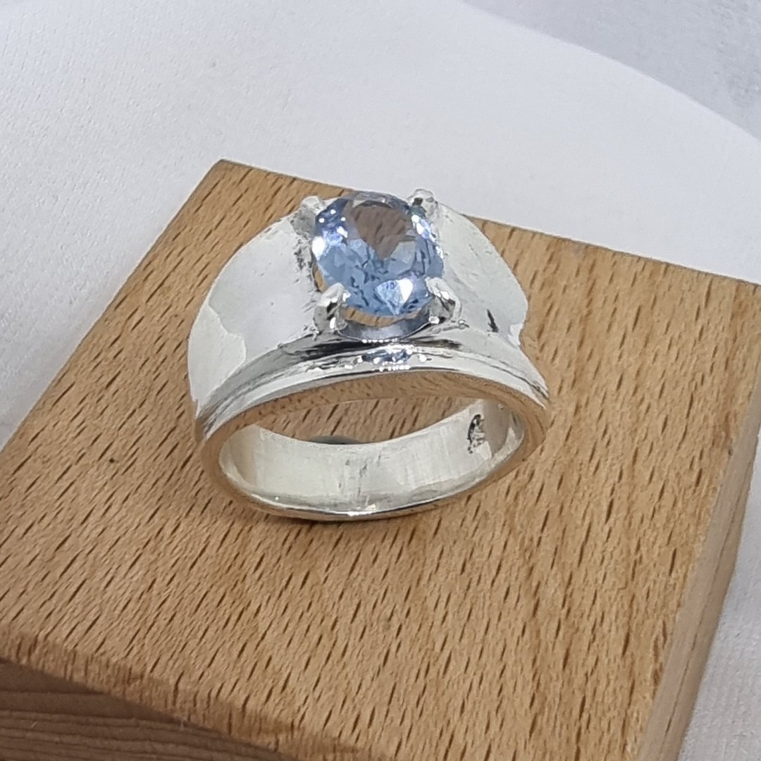 Wide silver band ring with blue topaz simulated gemstone image 0