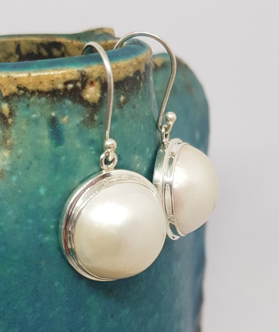 Large white mabe pearl earrings image 0