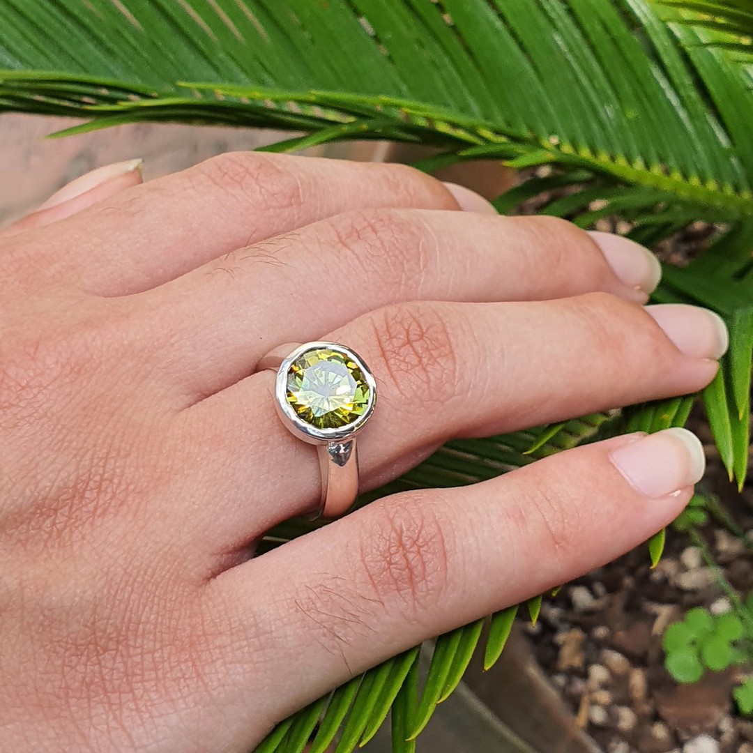 Silver synthetic peridot ring image 1
