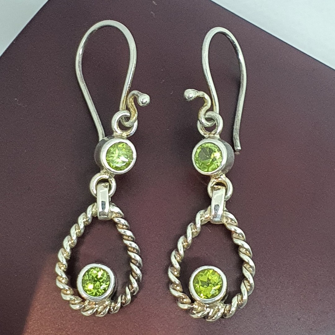 Silver peridot earrings, longer hook style image 1
