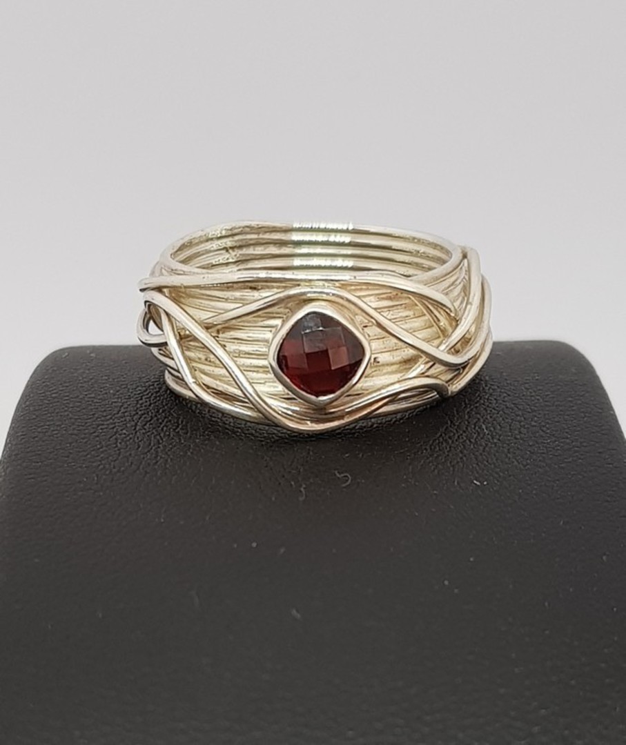 Wide silver band with sparkling garnet set in the top image 3