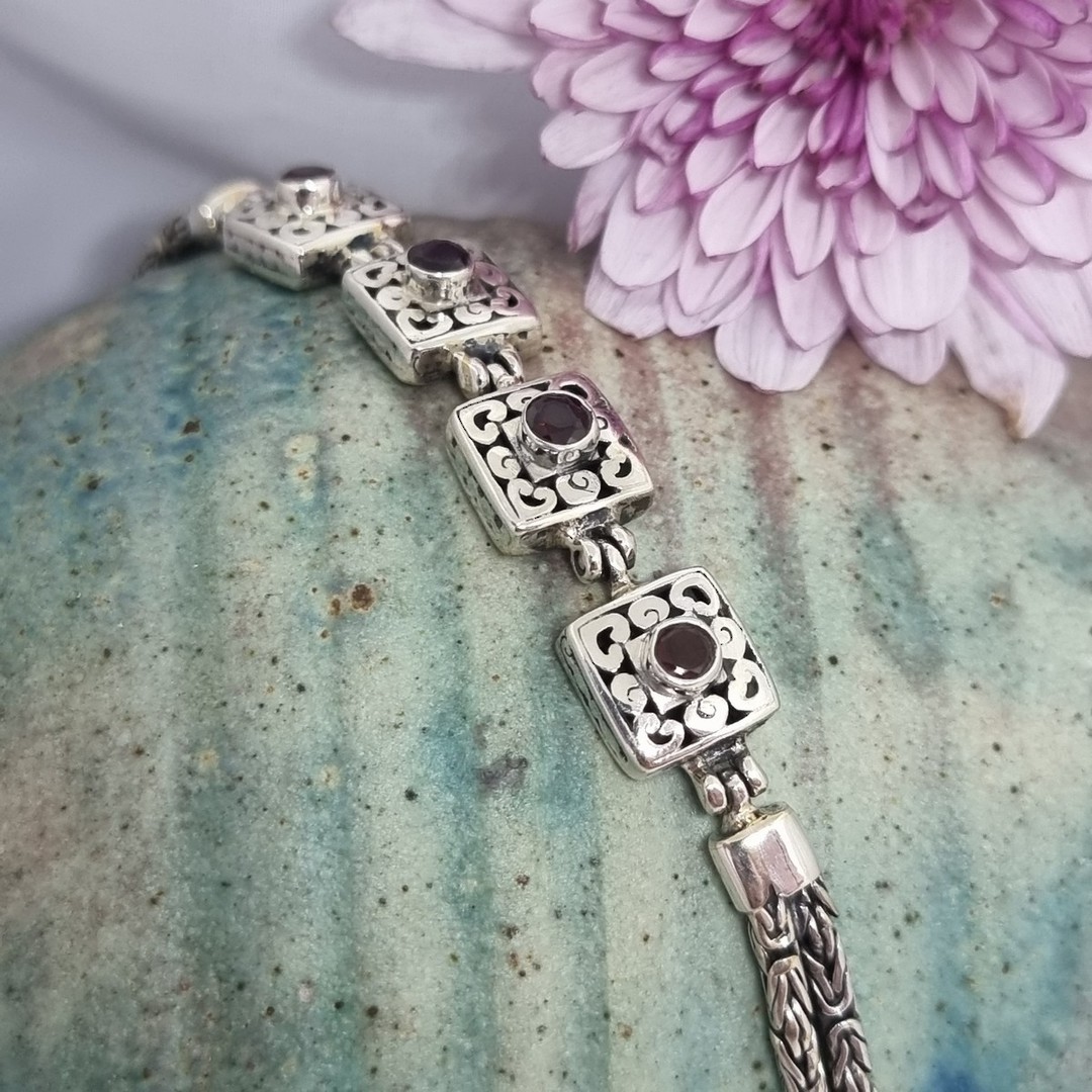 Sterling silver bracelet with garnet gemstones image 1