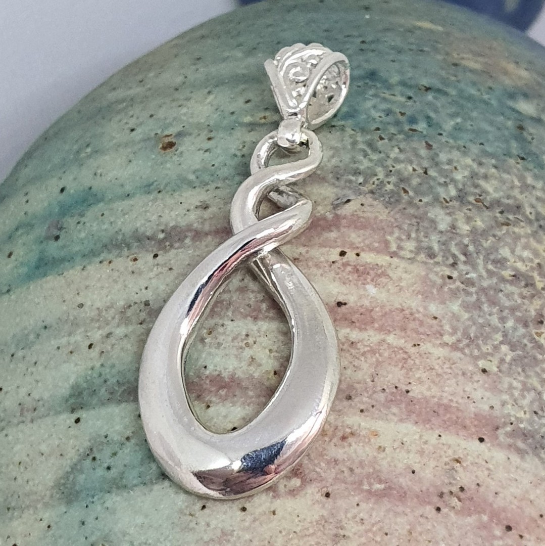 New Zealand solid sterling silver infinity pendant image 0