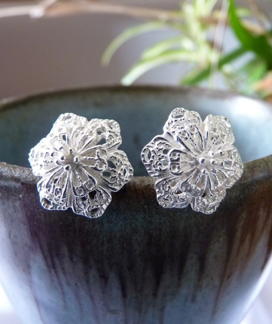 Silver flower stud earrings - last pair image 0