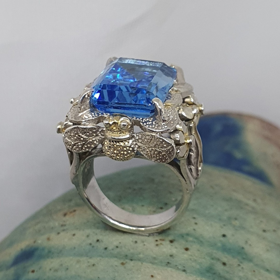 Large chunky silver ring with sparkling blue gemstone image 5