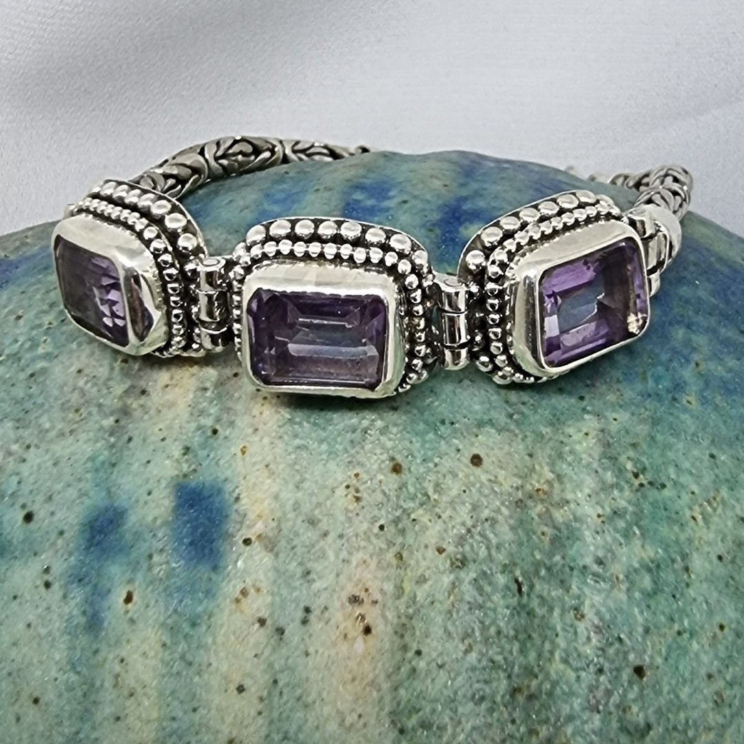 Sterling silver bracelet with purple gemstones image 1