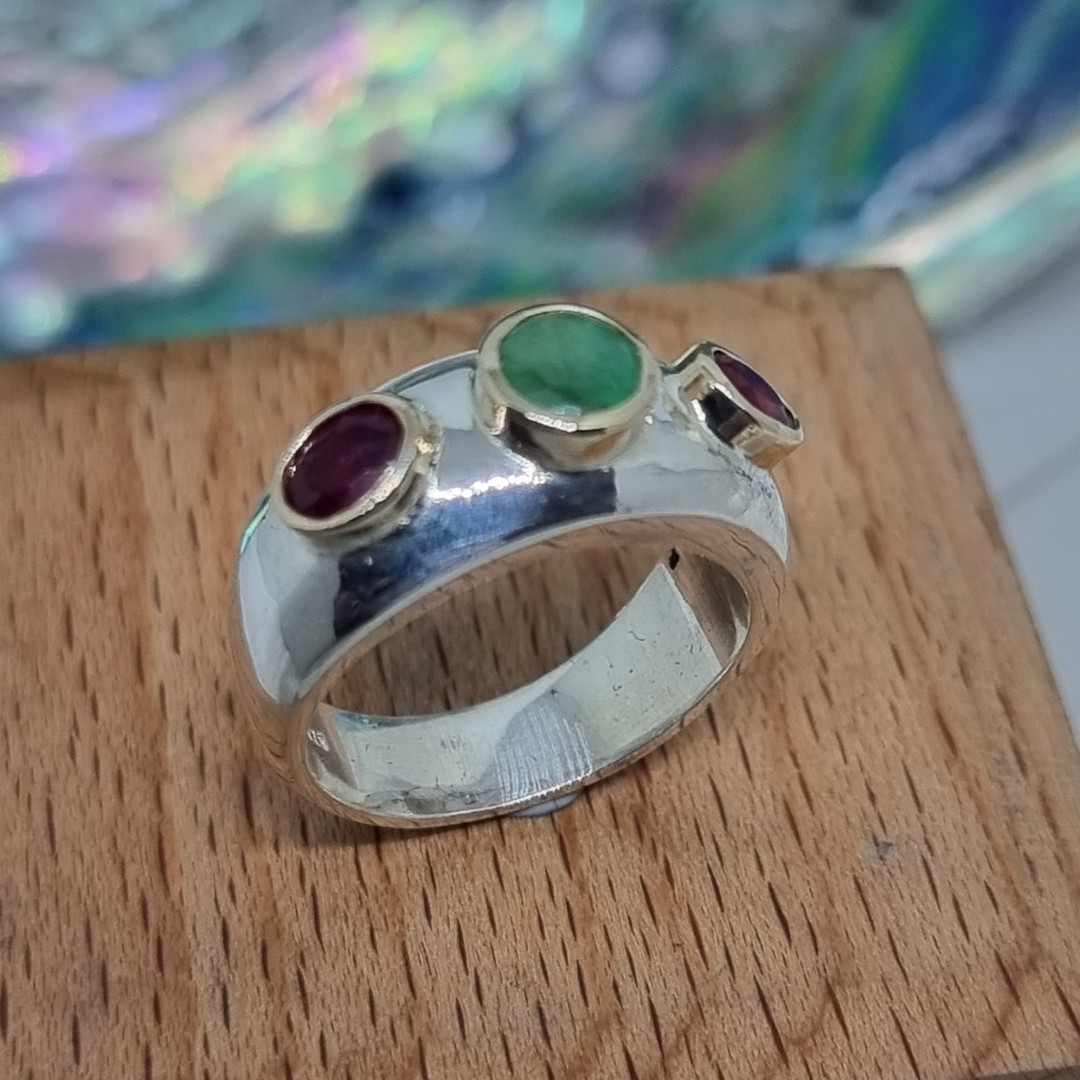 Silver ring with natural emerald and rubies in 9ct gold setting image 1