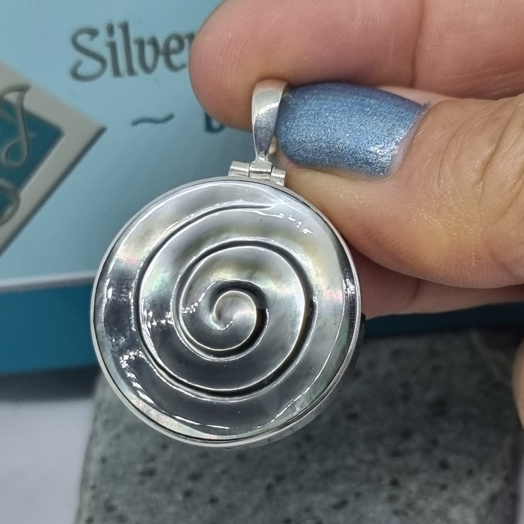 Sterling silver carved round shell pendant image 0