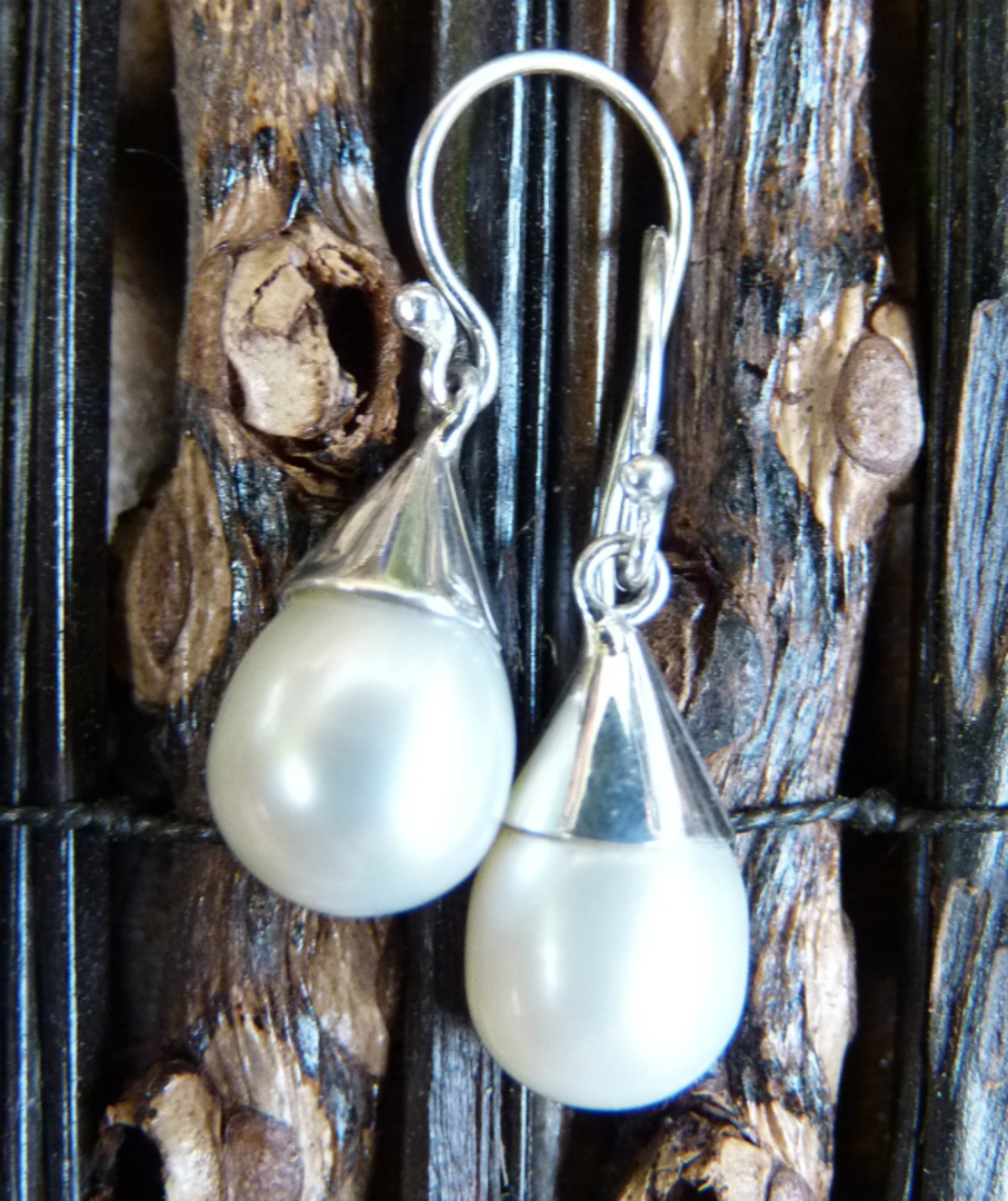 White pearl earrings set in sterling silver cup image 2